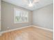 Bright bedroom with hardwood floors and plantation shutters at 1012 River Heights Ave, Tampa, FL 33603