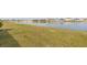 Large backyard with lake view at 1024 Golden Shiner Ave, Ruskin, FL 33570