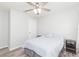 Bedroom with a full-size bed and ceiling fan at 1024 Golden Shiner Ave, Ruskin, FL 33570