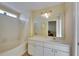 Clean bathroom with a shower/tub combo and vanity at 10313 Lakeside Vista Dr, Riverview, FL 33569