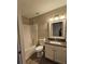 Well-lit bathroom with granite vanity and tub at 10459 Fly Fishing St, Riverview, FL 33569