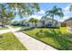 House exterior showing front yard, driveway and landscaping at 11441 Cypress Reserve Dr, Tampa, FL 33626