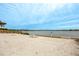 Relaxing sandy beach area with lake view at 11550 Lake Lucaya Dr, Riverview, FL 33579