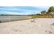 White sandy beach with lake access at 11550 Lake Lucaya Dr, Riverview, FL 33579