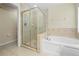 Bathroom boasts a shower and bathtub combo at 12922 Saulston Pl, Hudson, FL 34669