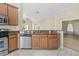 Well-equipped kitchen featuring granite countertops at 12922 Saulston Pl, Hudson, FL 34669