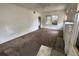 Bright living room with large windows and ceiling fan at 1311 11Th S Ave, St Petersburg, FL 33705