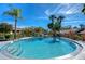 Refreshing community pool perfect for relaxation at 1311 Powderpuff Dr # 1003, Dunedin, FL 34698