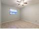 Bedroom with ceiling fan, neutral walls and tiled floors at 13851 102Nd Ave, Largo, FL 33774