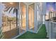 Spacious balcony with artificial turf and glass doors at 175 1St S St # 211, St Petersburg, FL 33701