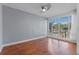 Bright bedroom with hardwood floors and large windows at 175 1St S St # 211, St Petersburg, FL 33701