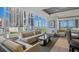 Elegant lounge with floor-to-ceiling windows and city views at 175 1St S St # 211, St Petersburg, FL 33701