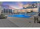 Inviting pool area with patio furniture at sunset at 175 1St S St # 211, St Petersburg, FL 33701