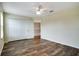 Spacious bedroom with double doors leading to a loft at 18809 Chaville Rd, Lutz, FL 33558