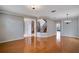 Elegant dining room, hardwood floors, and view of staircase at 18809 Chaville Rd, Lutz, FL 33558