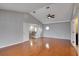 Main bedroom with hardwood floors and access to a loft area at 18809 Chaville Rd, Lutz, FL 33558