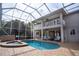 Pool and spa with patio furniture at 18809 Chaville Rd, Lutz, FL 33558