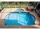 Relaxing pool and spa with brick deck at 18809 Chaville Rd, Lutz, FL 33558