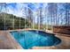 Enclosed pool and spa with a lake view at 18809 Chaville Rd, Lutz, FL 33558