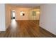 Bright dining room featuring hardwood floors and mirrors at 19029 Us Highway 19 N # 23C, Clearwater, FL 33764