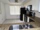 Kitchen with granite countertops and stainless steel sink at 19029 Us Highway 19 N # 23C, Clearwater, FL 33764