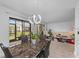 Bright dining area with sliding doors leading to the patio at 20 Sylvia Pl, Oldsmar, FL 34677