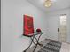 Bright and airy entryway with a glass-top console table and red rose art at 20 Sylvia Pl, Oldsmar, FL 34677