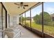 Relaxing screened porch overlooking backyard at 20 Sylvia Pl, Oldsmar, FL 34677