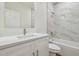 Clean bathroom with white vanity and marble shower at 2204 E 12Th Ave, Tampa, FL 33605