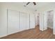 Spacious bedroom featuring wood-look floors and ample closet space at 2204 E 12Th Ave, Tampa, FL 33605