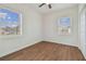 Spacious bedroom with hardwood floors and large windows at 2204 E 12Th Ave, Tampa, FL 33605