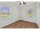 Bright bedroom with wood-look floors and large windows at 2204 E 12Th Ave, Tampa, FL 33605