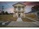 Two-story house with a front porch and driveway at 2204 E 12Th Ave, Tampa, FL 33605