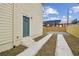 House exterior with a green door and paved driveway at 2204 E 12Th Ave, Tampa, FL 33605