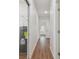 Bright hallway with wood floors, leading to other rooms at 2204 E 12Th Ave, Tampa, FL 33605