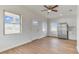 Living room with hardwood floors and kitchen access at 2204 E 12Th Ave, Tampa, FL 33605