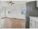 Spacious living area with vinyl plank flooring and ceiling fan at 2204 E 12Th Ave, Tampa, FL 33605