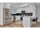 Modern kitchen with stainless steel appliances and white cabinets at 2215 Cedar Dr, Dunedin, FL 34698