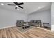 Bright living room featuring hardwood floors and neutral color palette at 2215 Cedar Dr, Dunedin, FL 34698