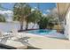 Relaxing pool area with deck and lounge chairs at 2215 Cedar Dr, Dunedin, FL 34698