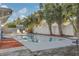 Inviting swimming pool with a wooden deck and lounge chairs at 2215 Cedar Dr, Dunedin, FL 34698