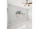 Spacious bedroom with large window and ceiling fan at 2503 W Crawford St, Tampa, FL 33614