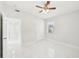 Bedroom with ceiling fan and marble flooring at 2503 W Crawford St, Tampa, FL 33614