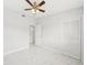 Bright bedroom with tile floors and built in closet at 2503 W Crawford St, Tampa, FL 33614