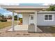 House exterior with covered porch and gray siding at 2503 W Crawford St, Tampa, FL 33614