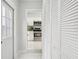 Modern kitchen view from hallway with white cabinets at 2503 W Crawford St, Tampa, FL 33614