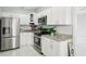 Modern kitchen featuring stainless steel appliances and white cabinets at 2503 W Crawford St, Tampa, FL 33614