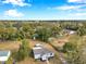 Aerial view of home on a spacious lot with surrounding trees at 2606 S Wilder Loop, Plant City, FL 33565