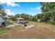 Spacious backyard with gazebo, boat, and fire pit at 2606 S Wilder Loop, Plant City, FL 33565