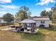 Backyard patio with gazebo, seating, and boat at 2606 S Wilder Loop, Plant City, FL 33565